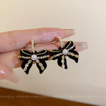 Silver Needle Zircon Bow Pearl Earrings