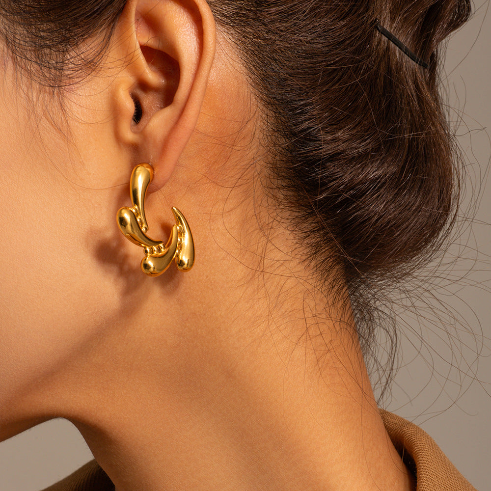 Gold Titanium Molten Steel Drops Rotate Earrings