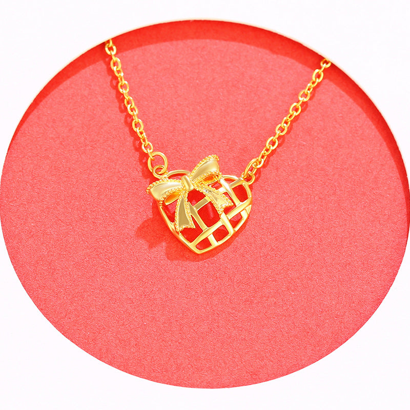 Gold Bow Hollow Heart Alloy Necklace