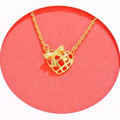 Gold Bow Hollow Heart Alloy Necklace