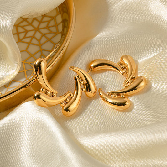 Gold Titanium Molten Steel Drops Rotate Earrings