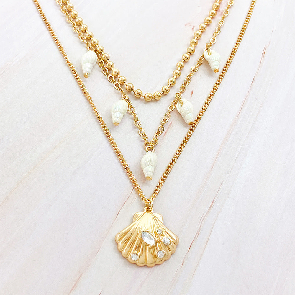 Three-tiered Shell and Conch Necklace