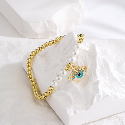 Halo Evil Eye Pendant Pearl Bead Bracelet