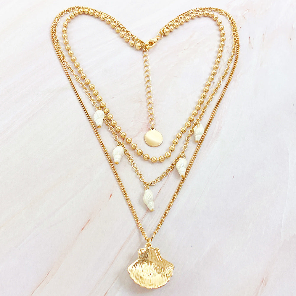 Three-tiered Shell and Conch Necklace
