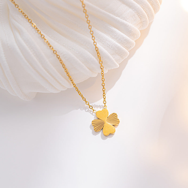 Four-leaf Clover Embossed Twill Titanium Steel Necklace