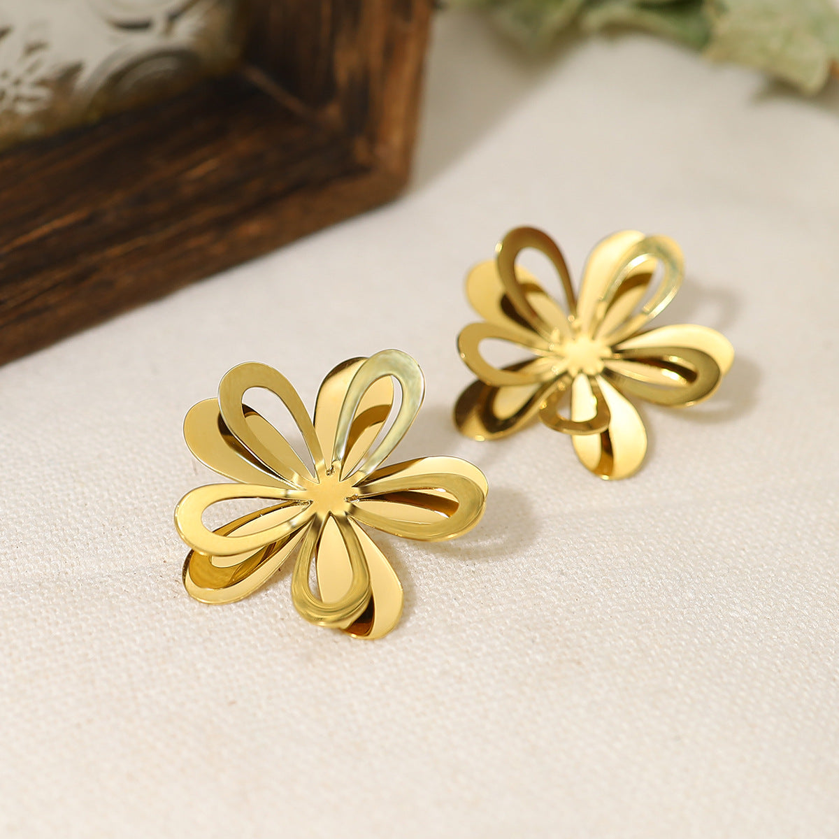 Gold Flower Hollow Titanium Steel Earrings
