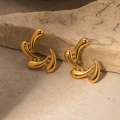 Gold Titanium Molten Steel Drops Rotate Earrings